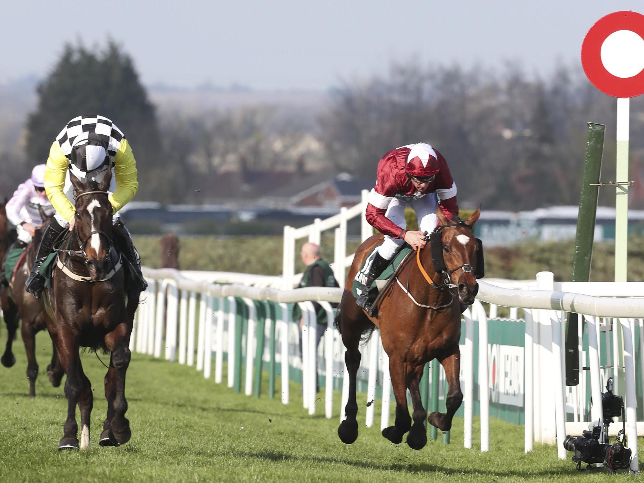 Jockey Davy Russell on Tiger Roll beats jockey David Mullins on Pleasant Company