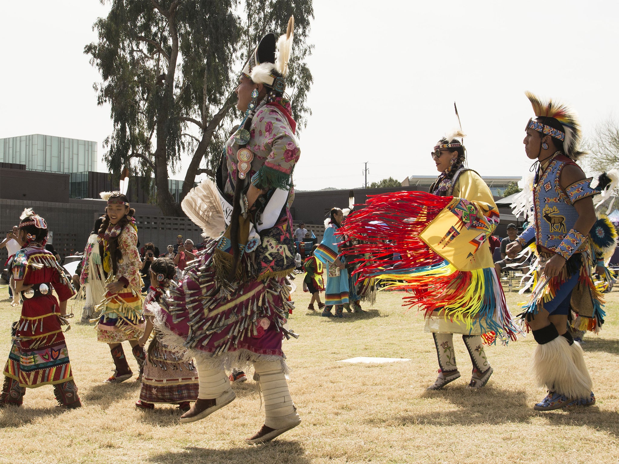 Dancers perform a Two-Spirit Powwow. Powwows are usually separated into male and female dances, but in honour of Two-Spirit, gender remains mixed