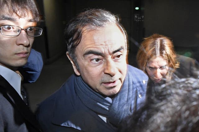 Carlos Ghosn leaves his lawyer's office in Tokyo, following his fourth arrest