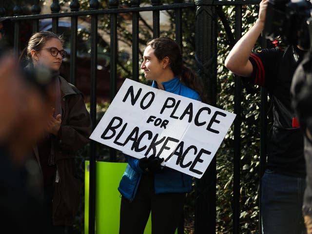 Protestors rally against Virginia Governor Ralph Northam in February 2019