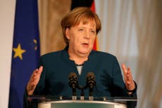 Angela Merkel likens Brexit Irish border question to Iron Curtain
