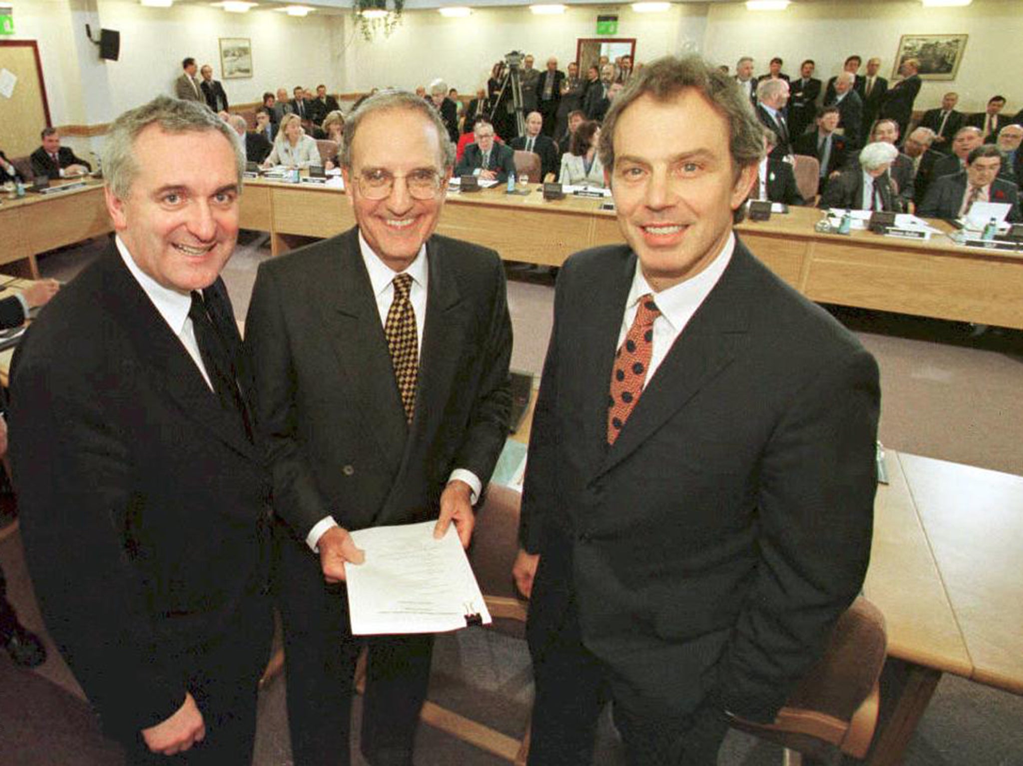 From left: Irish prime minister Bertie Ahern, US senator George Mitchell and British PM Tony Blair sign the Good Friday Agreement in 1998