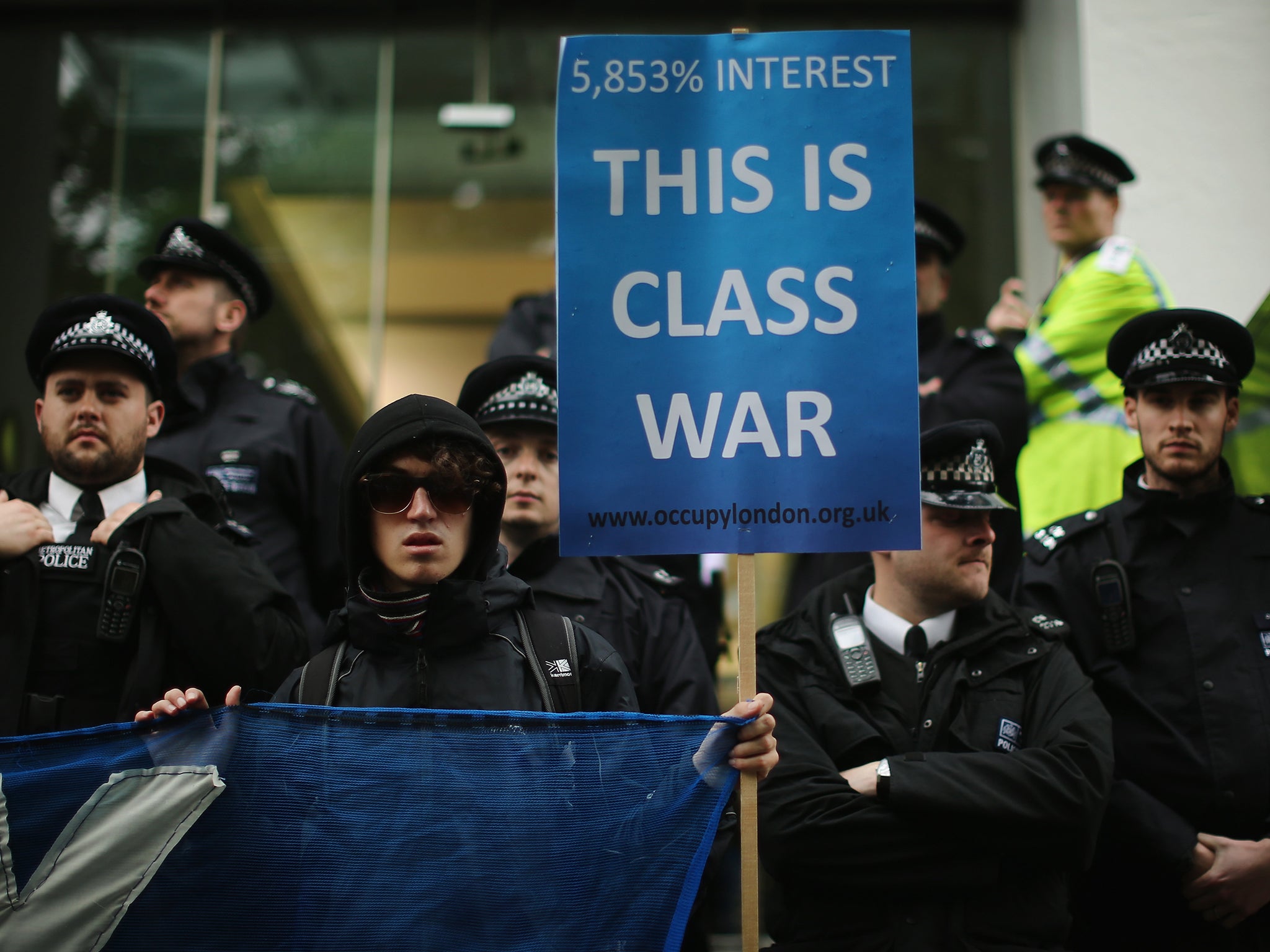 Protesters demonstrate against Wonga after the May Day march in 2013