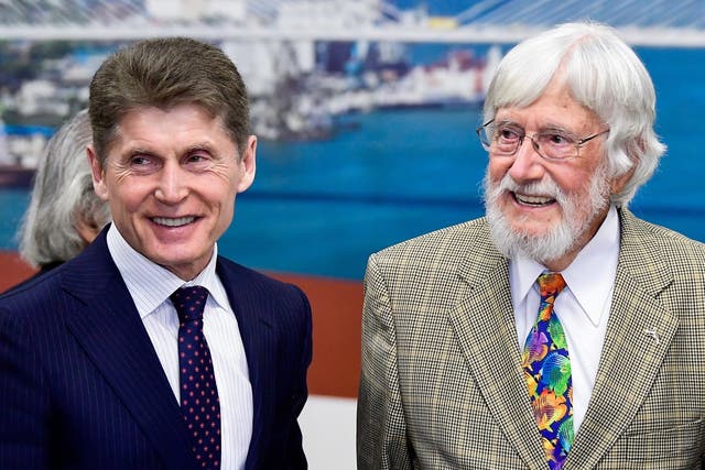 Primorye Territory Governor Oleg Kozhemyako (L) and French explorer Jean-Michel Cousteau, president of the Ocean Futures Society, during a briefing on the so-called 'whale jail'