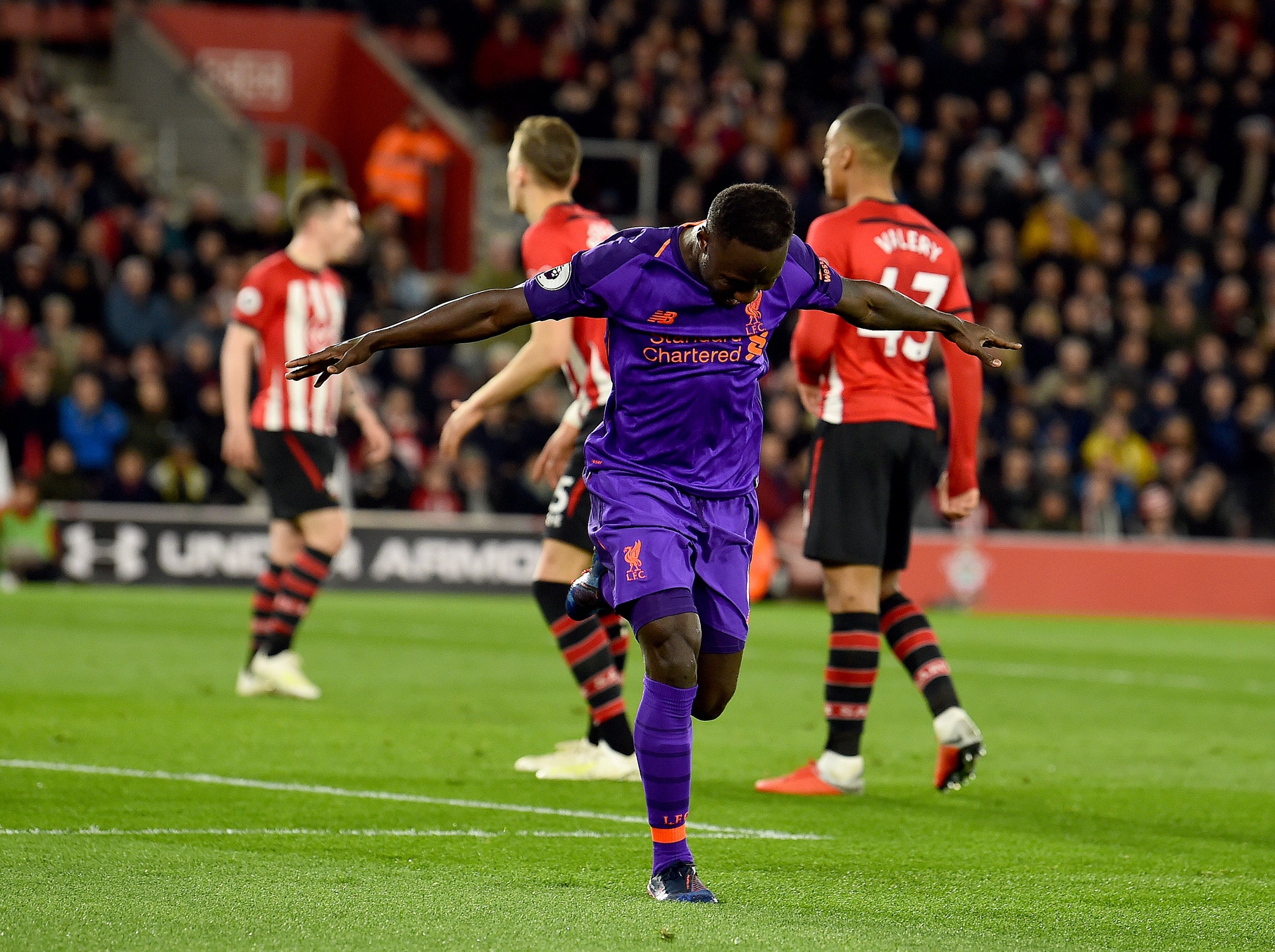 Naby Keita celebrates equalising for Liverpool