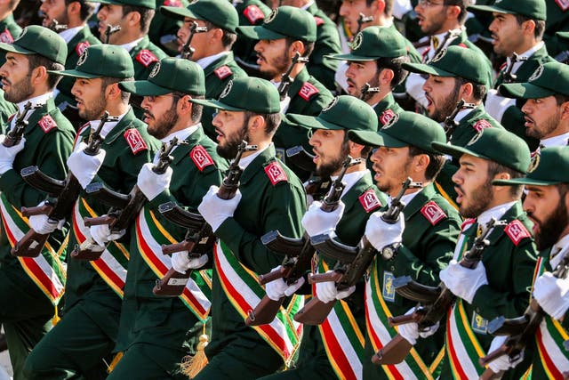 Members of Iran's Revolutionary Guards Corps (IRGC) march during the annual military parade marking the anniversary of the outbreak of the devastating 1980-1988 war with Saddam Hussein's Iraq, in the capital Tehran