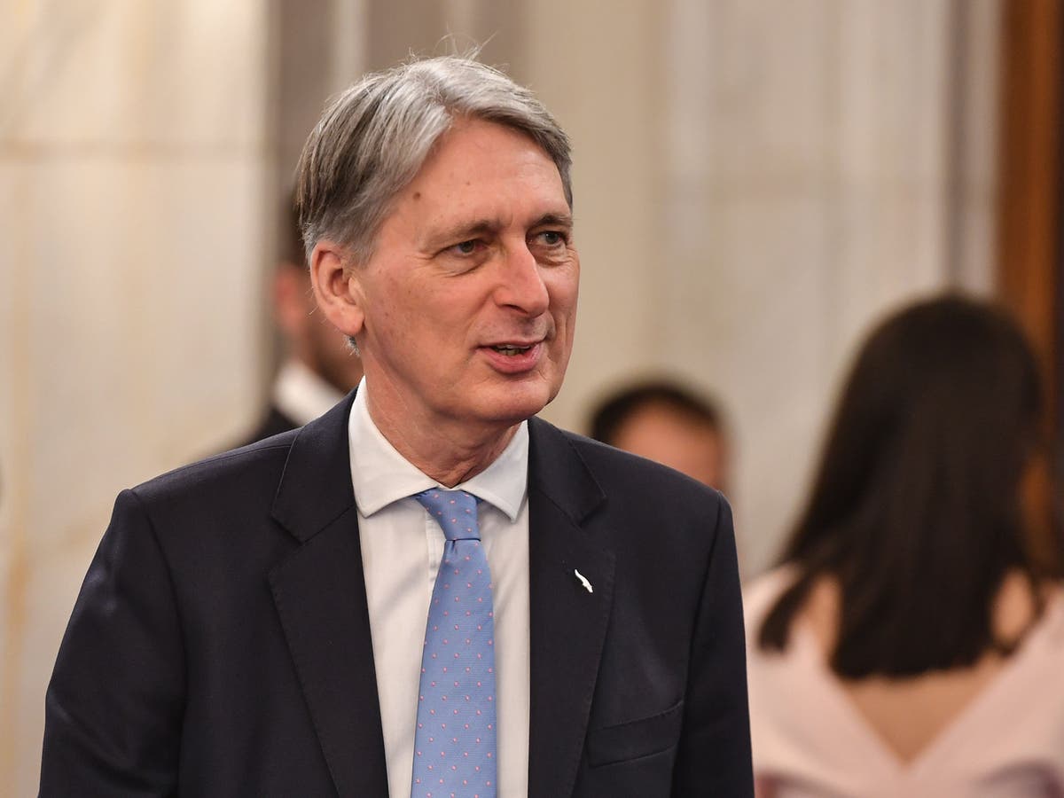 Philip Hammond accused of trying to kill off landmark action on global warming by claiming bill will top £1 trillion