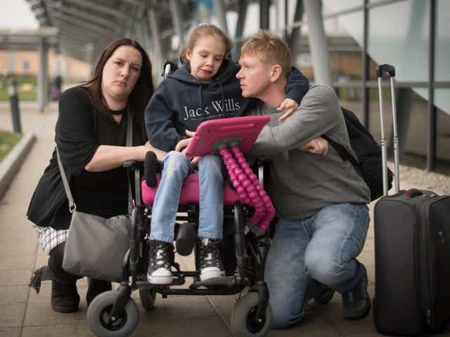 Emma Appleby (left), her partner Lee and their daughter Teagan at Southend airport on Saturday