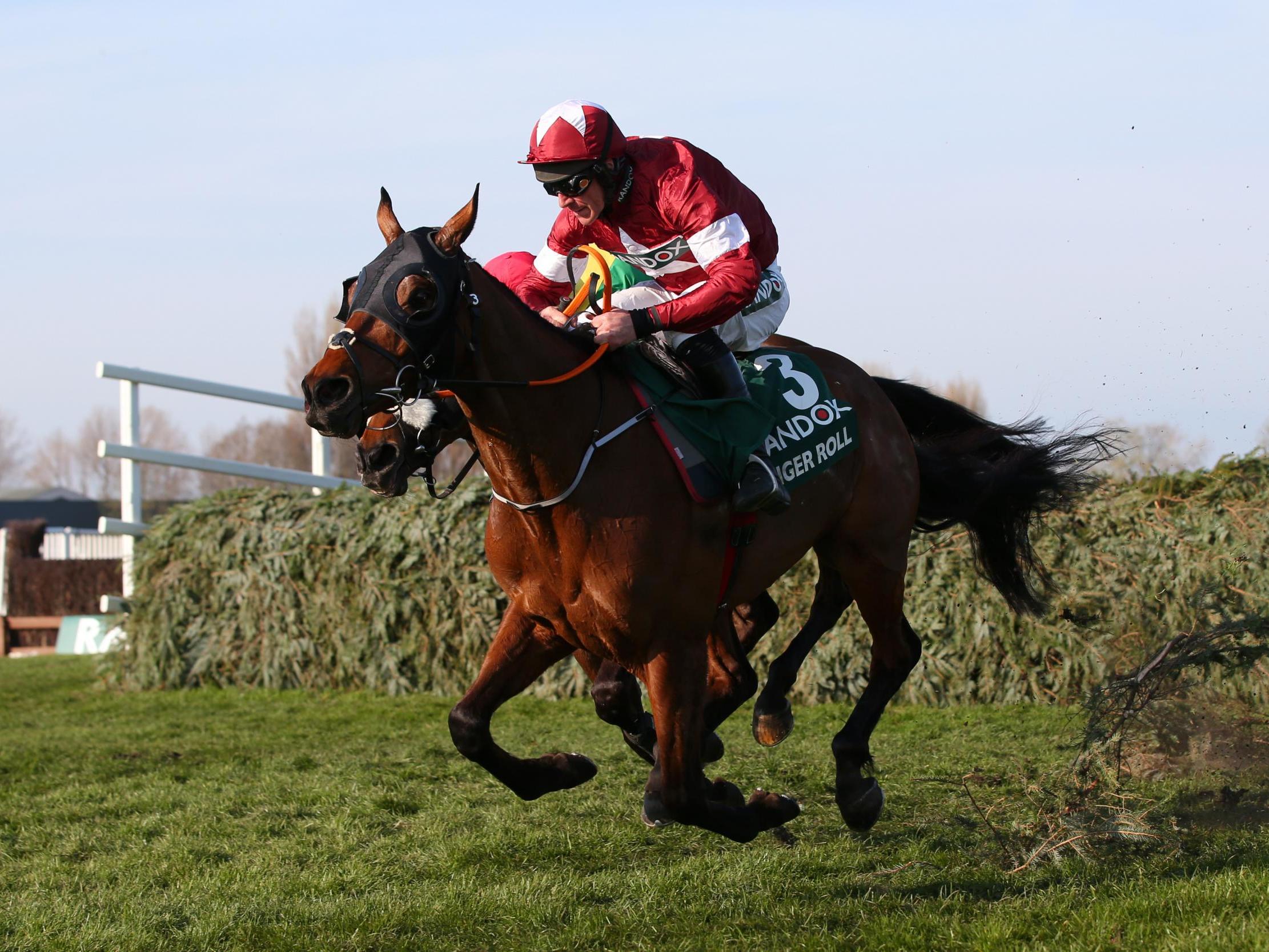 &#13;
Davy Russell rides Tiger Roll to victory at Aintree &#13;
