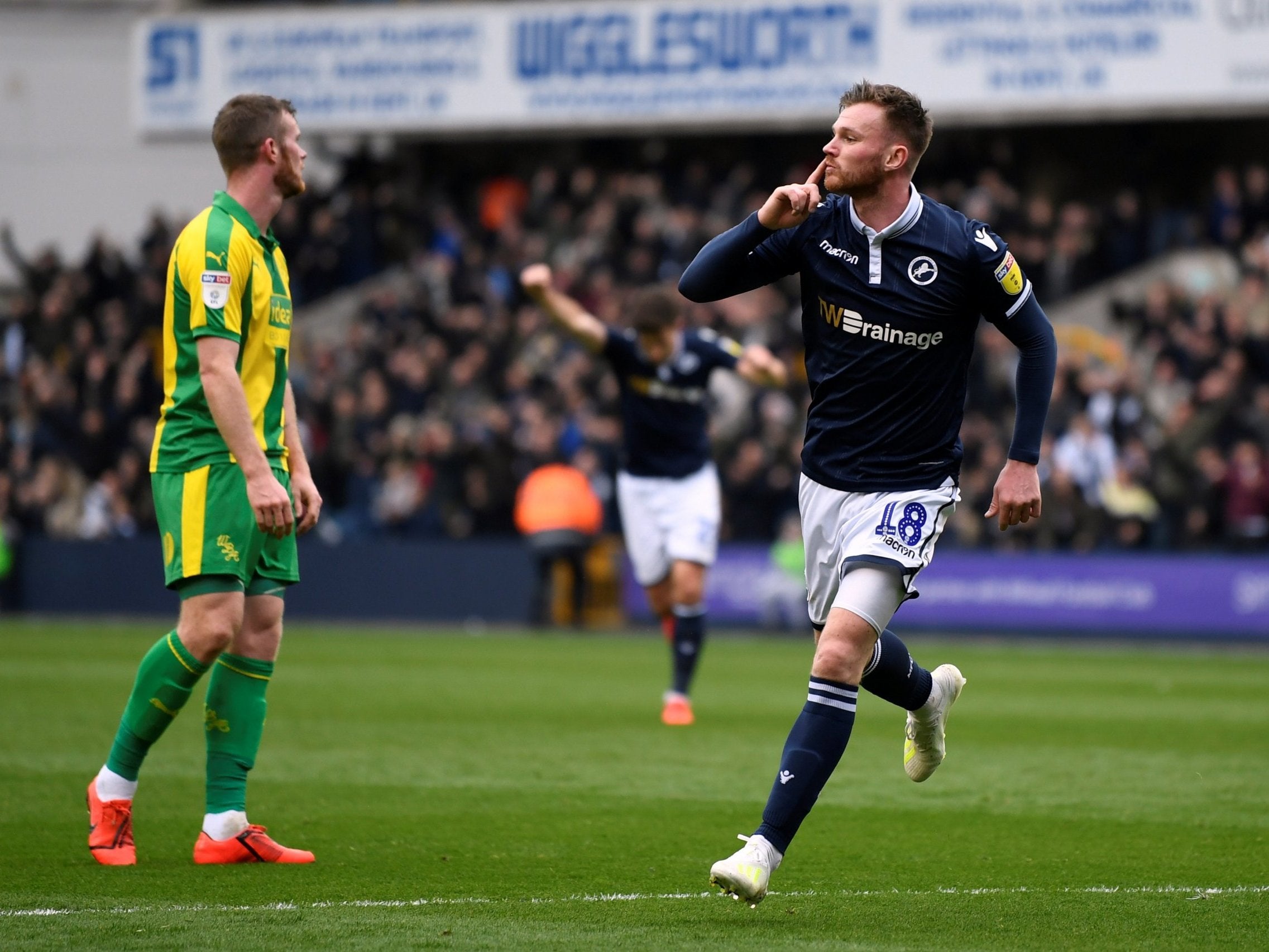 Ryan Tunnicliffe celebrates opening the scoring for Millwall