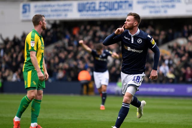 Ryan Tunnicliffe celebrates opening the scoring for Millwall