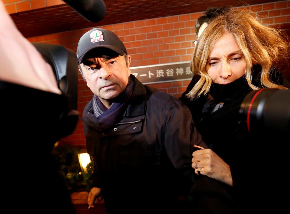 Former Nissan chairman Carlos Ghosn accompanied by his wife Carole Ghosn