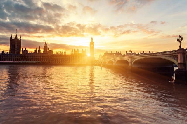 Houses of Parliament and Westminster Bridge at sunset in London, United Kingdom