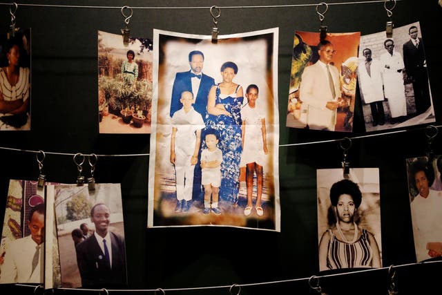 Pictures of the Rwandan Genocide victims donated by survivors are displayed at an exhibition at the Genocide Memorial in Gisozi in Kigali, Rwanda 6 April 2019