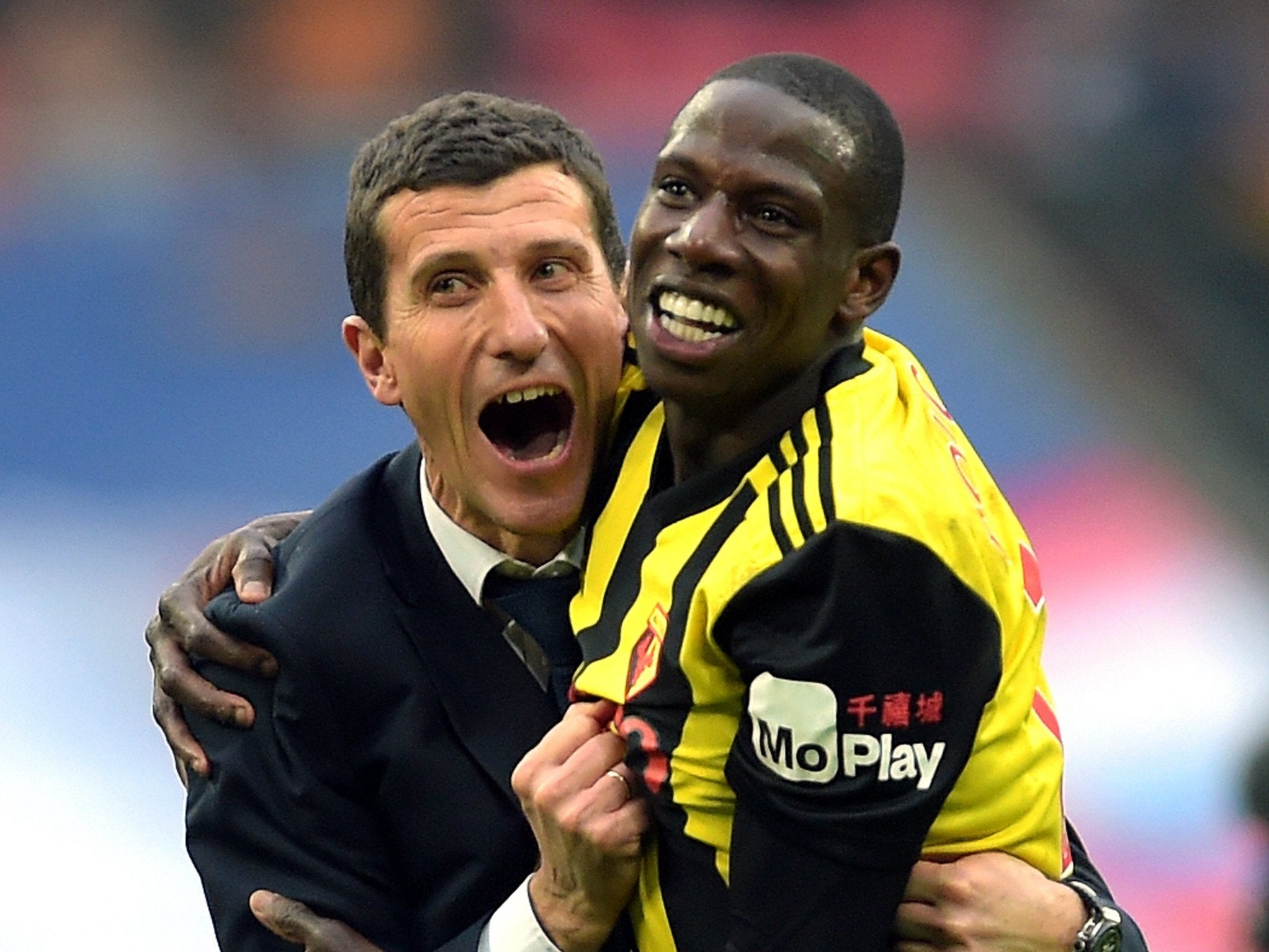 Watford head coach Javi Gracia celebrates together with Abdoulaye Doucoure