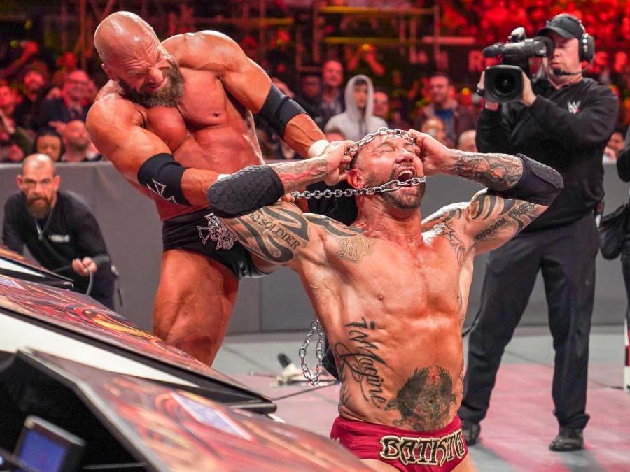 Triple H and Batista battle