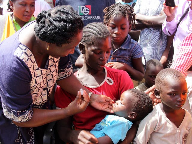 A child receives a cholera vaccine in Beira, Mozambique