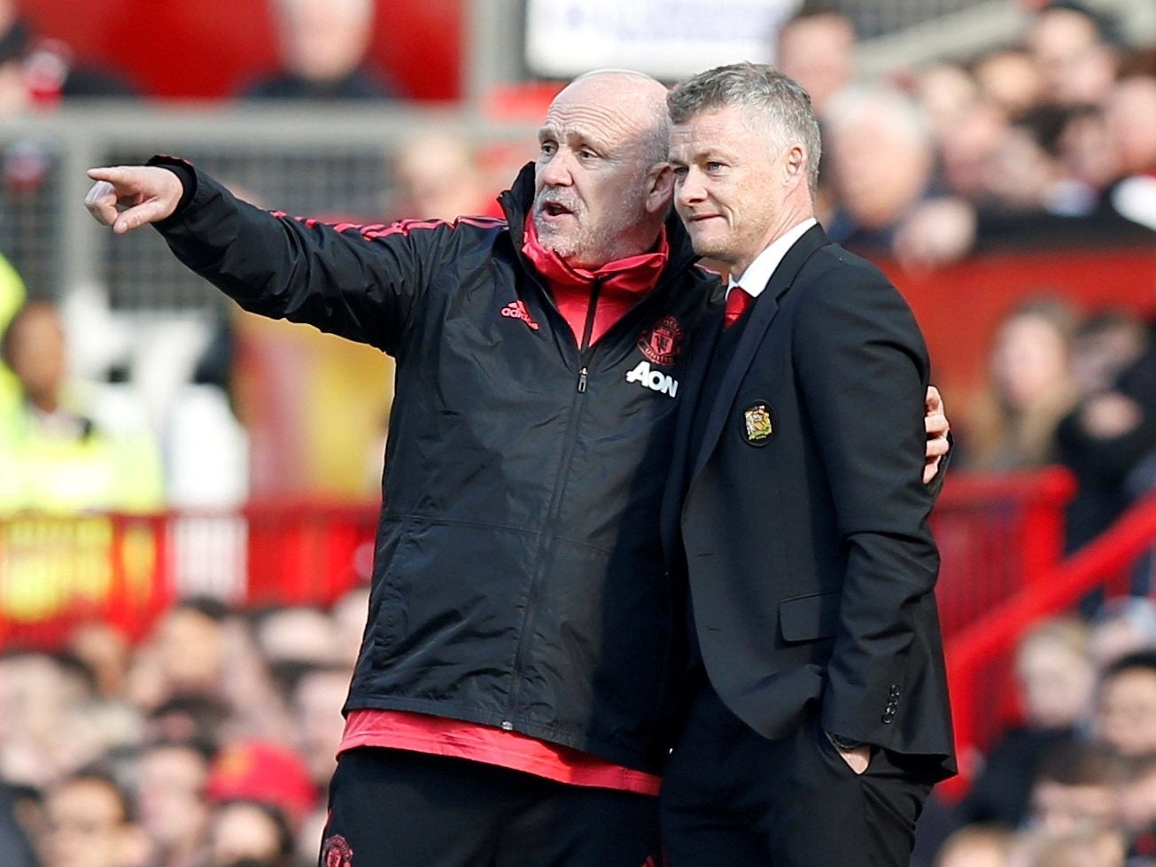 Manchester United manager Ole Gunnar Solskjaer and assistant coach Mike Phelan