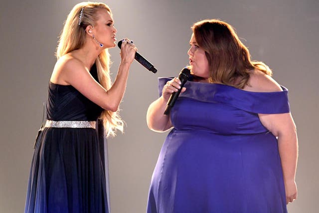 Carrie Underwood and Chrissy Metz perform onstage during the 54th Academy Of Country Music Awards at MGM Grand Garden Arena on 7 April, 2019 in Las Vegas, Nevada.