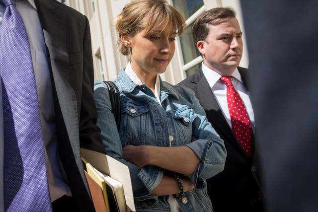 Allison Mack exits the US District Court for the Eastern District of New York following a status conference on 12 June, 2018 in the Brooklyn borough of New York City.