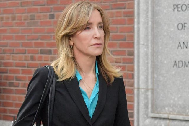 Felicity Huffman exits the John Joseph Moakley US Courthouse after appearing in Federal Court to answer charges stemming from college admissions scandal on 3 April, 2019 in Boston, Massachusetts.