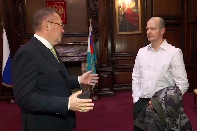 Russian ambassador to the UK Alexander Yakovenko, left, meets with Novichok poisoning victim Charlie Rowley.