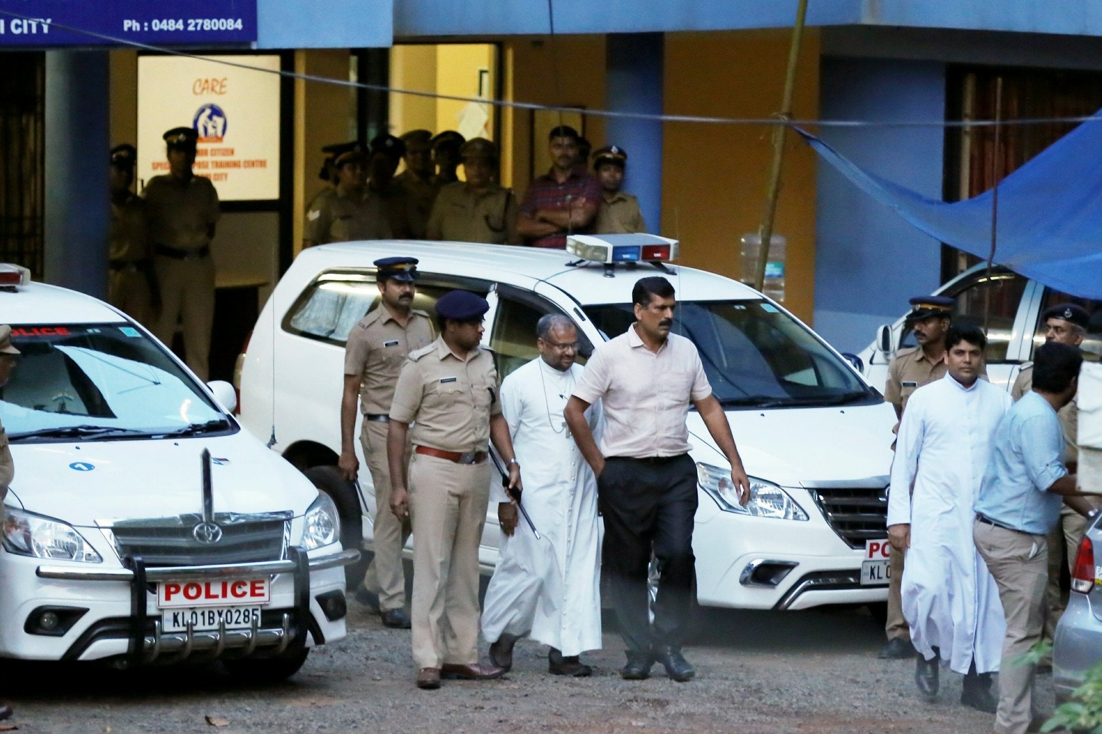 File photo dated 19 September 2018: bishop of the Indian city of Jalandhar, Franco Mulakkal, centre, leaves after being questioned by police in Kochi, India. Indian authorities charged the Roman Catholic bishop on Tuesday with repeatedly raping a nun in her rural convent, a case that helped make the sexual abuse of nuns a major issue in the church.