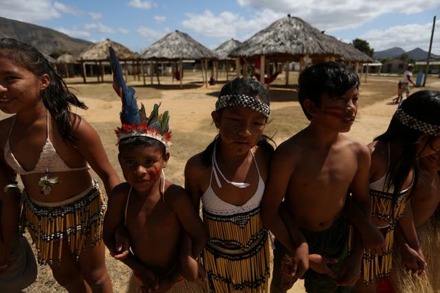 Macuxi children dance at a ceremony for indigenous leaders in Roraima state