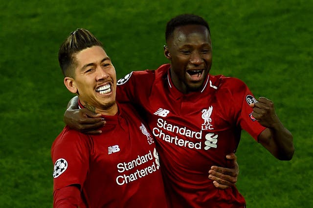 Roberto Firmino and Naby Keita celebrate Liverpool's second goal