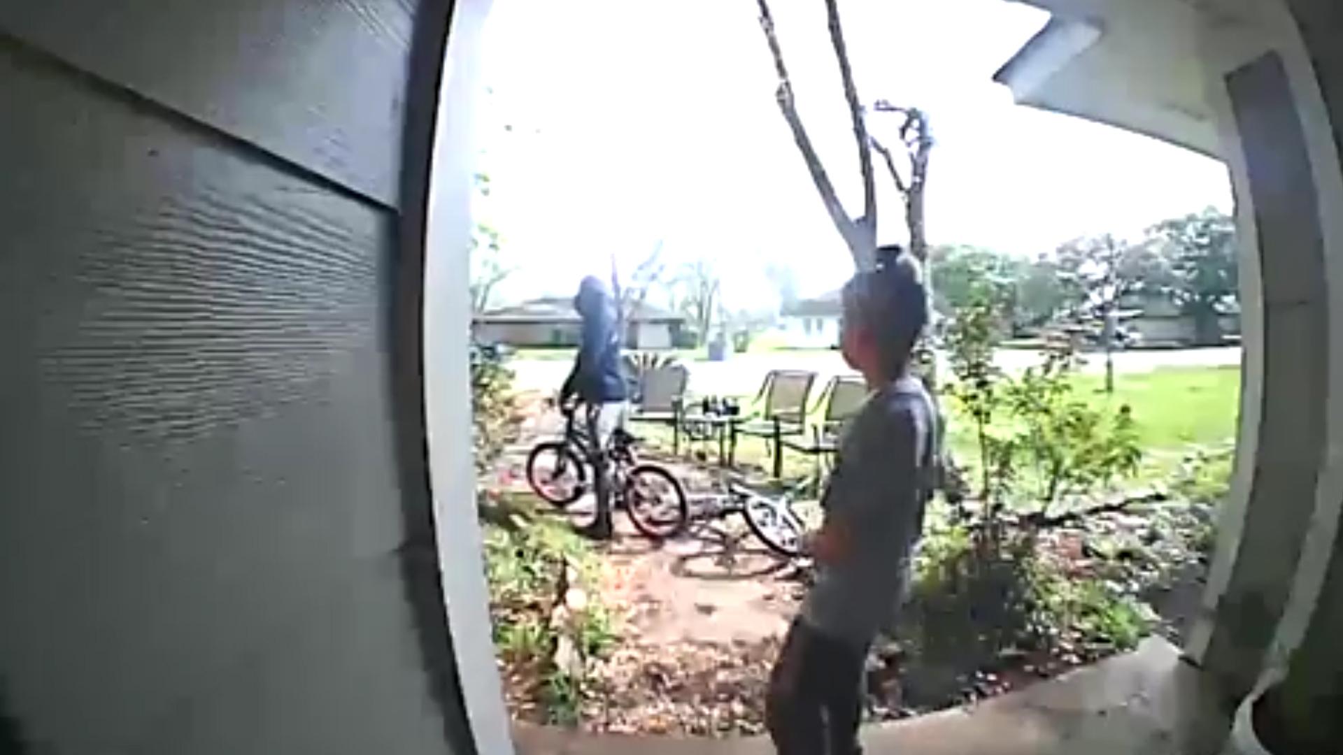 Man caught on CCTV stealing young boy's bike in front of him