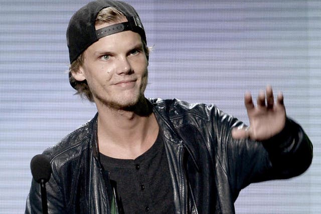Avicii accepts the Favorite Electronic Dance Music Artist award onstage during the 2013 American Music Awards at Nokia Theatre LA Live on 24 November, 2013 in Los Angeles, California.