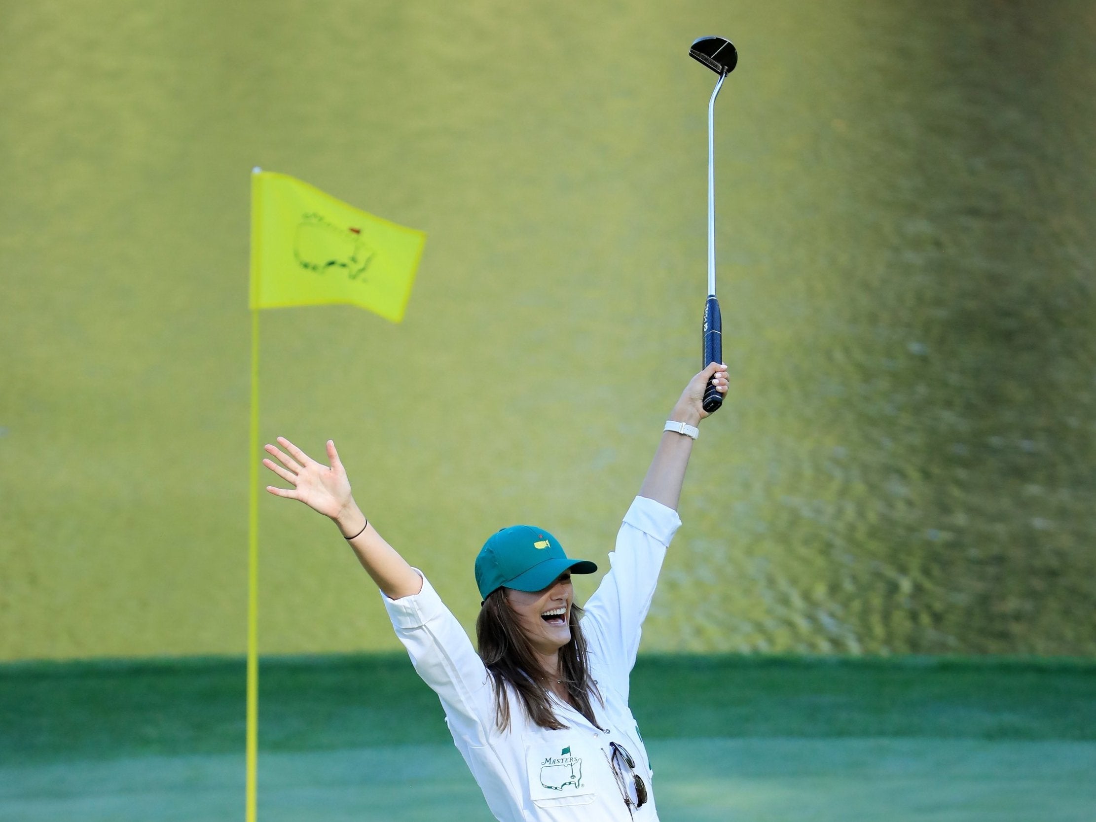 Chelsie Joce, girlfriend of Matt Wallace, celebrates making a putt during the Par-Three