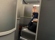 First-class plane passengers shamed for doing barefoot ‘footsie’