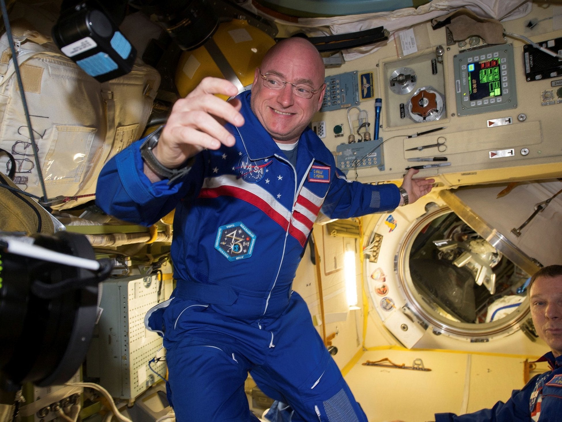Scott Kelly with flight engineer Sergey Volkov from the International Space Station in 2016 (Reuters)