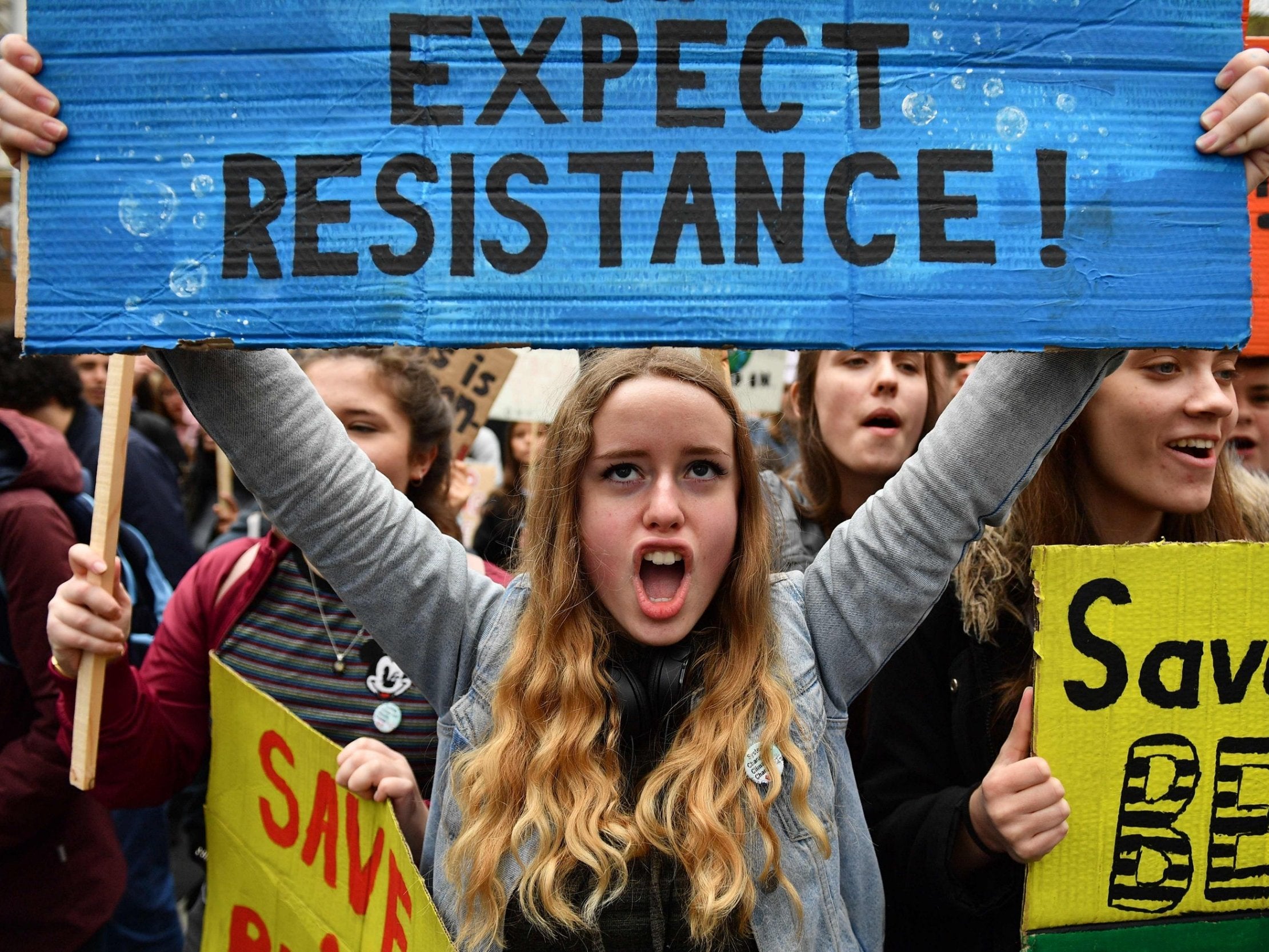 Students at the YouthStrike4Climate demonstration in Parliament Square, London, on Friday