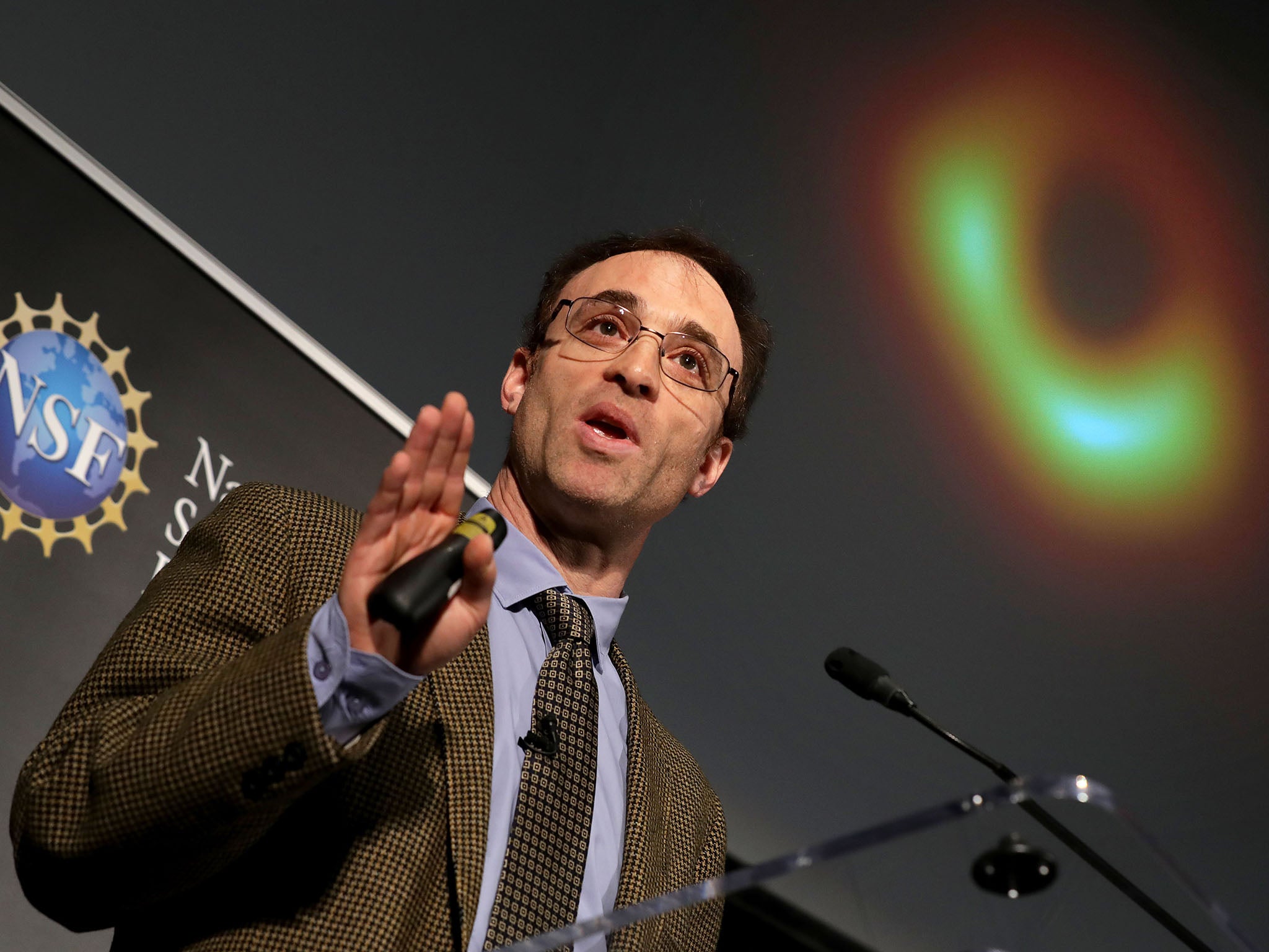 In Washington this month, EHT director Sheperd Doeleman reveals the first photograph of a black hole