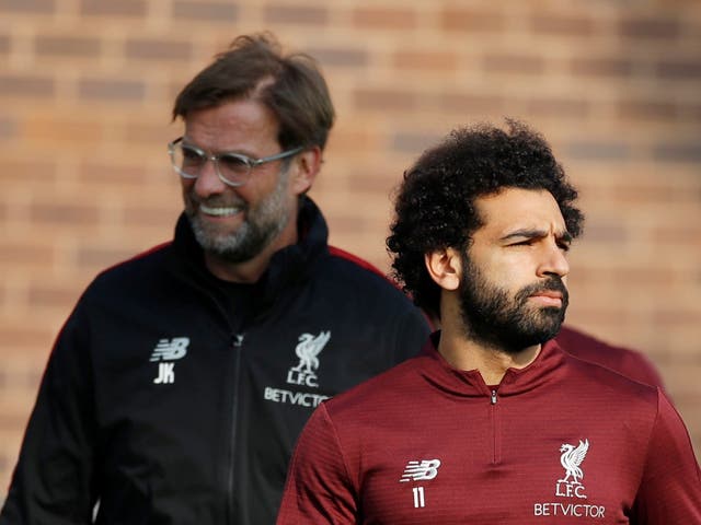 Mohamed Salah and manager Juergen Klopp during training