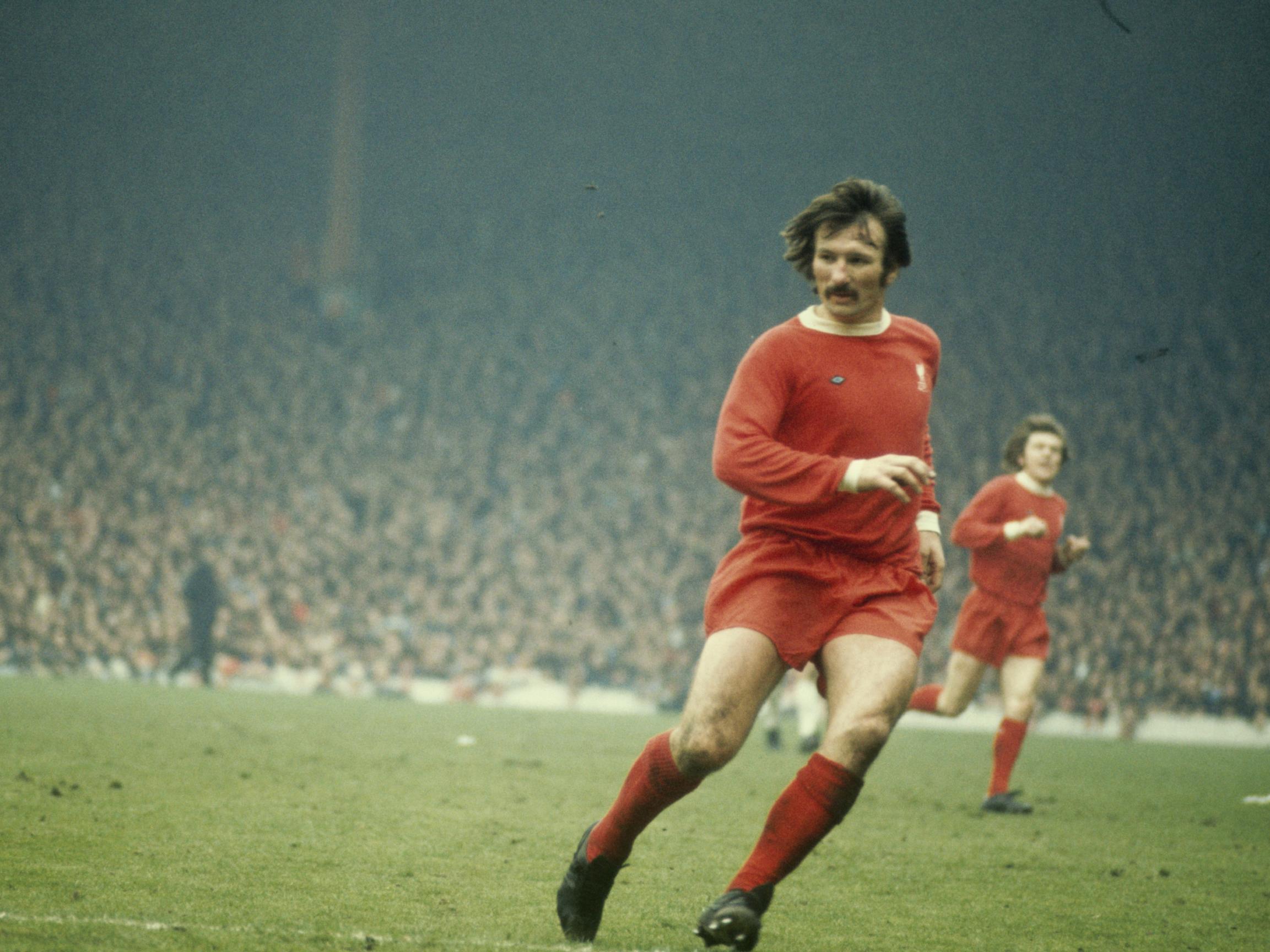 Tommy Smith in action for Liverpool at Anfield (Getty )