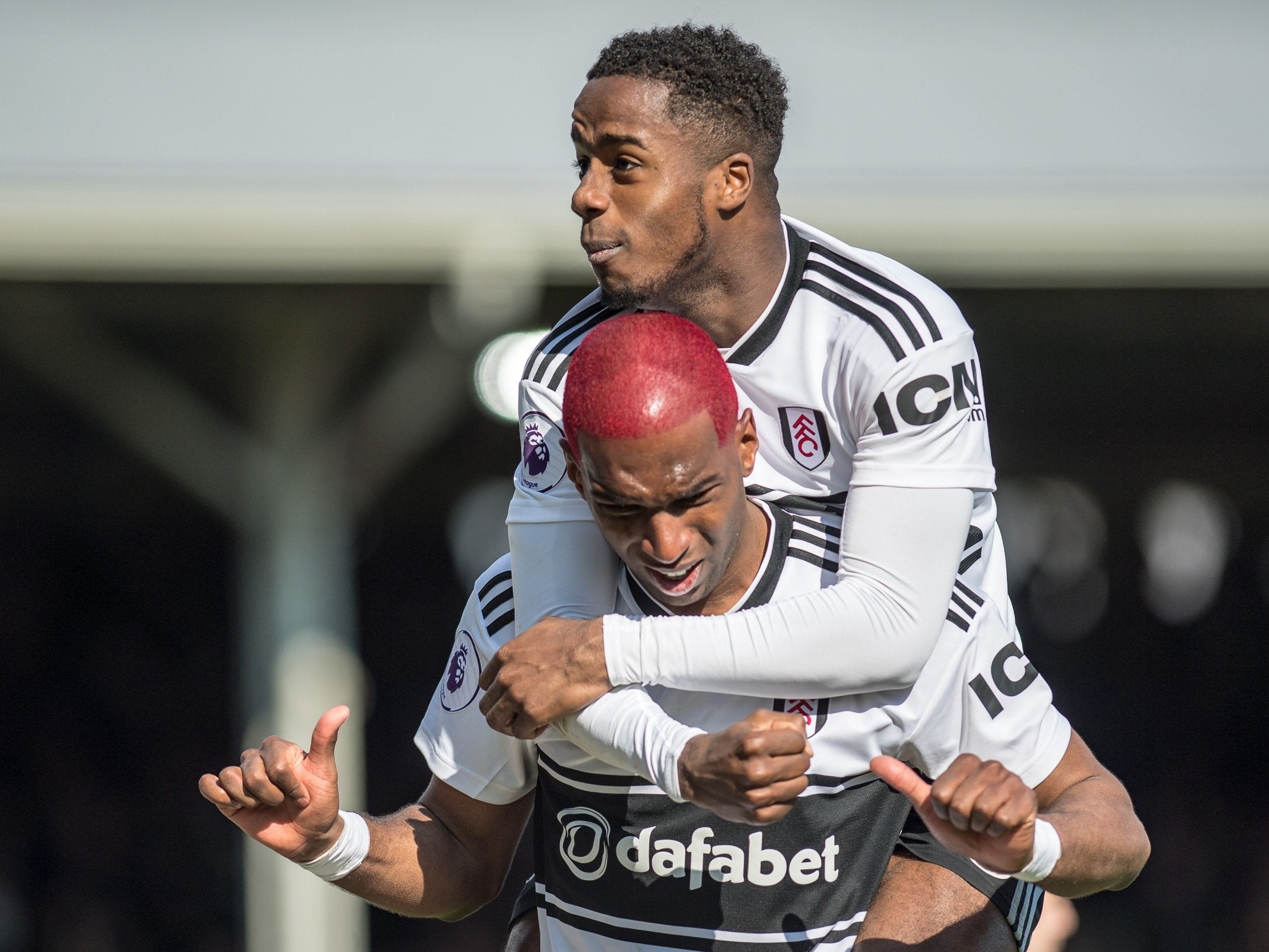 Ryan Babel celebrates scoring Fulham's second