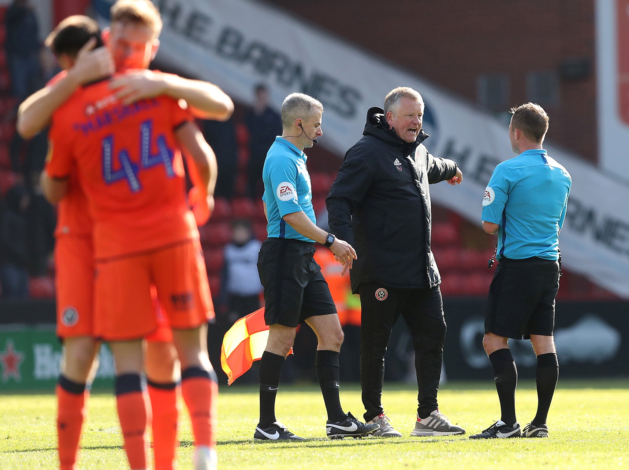 Chris Wilder confronts the ref after Millwall's late goal