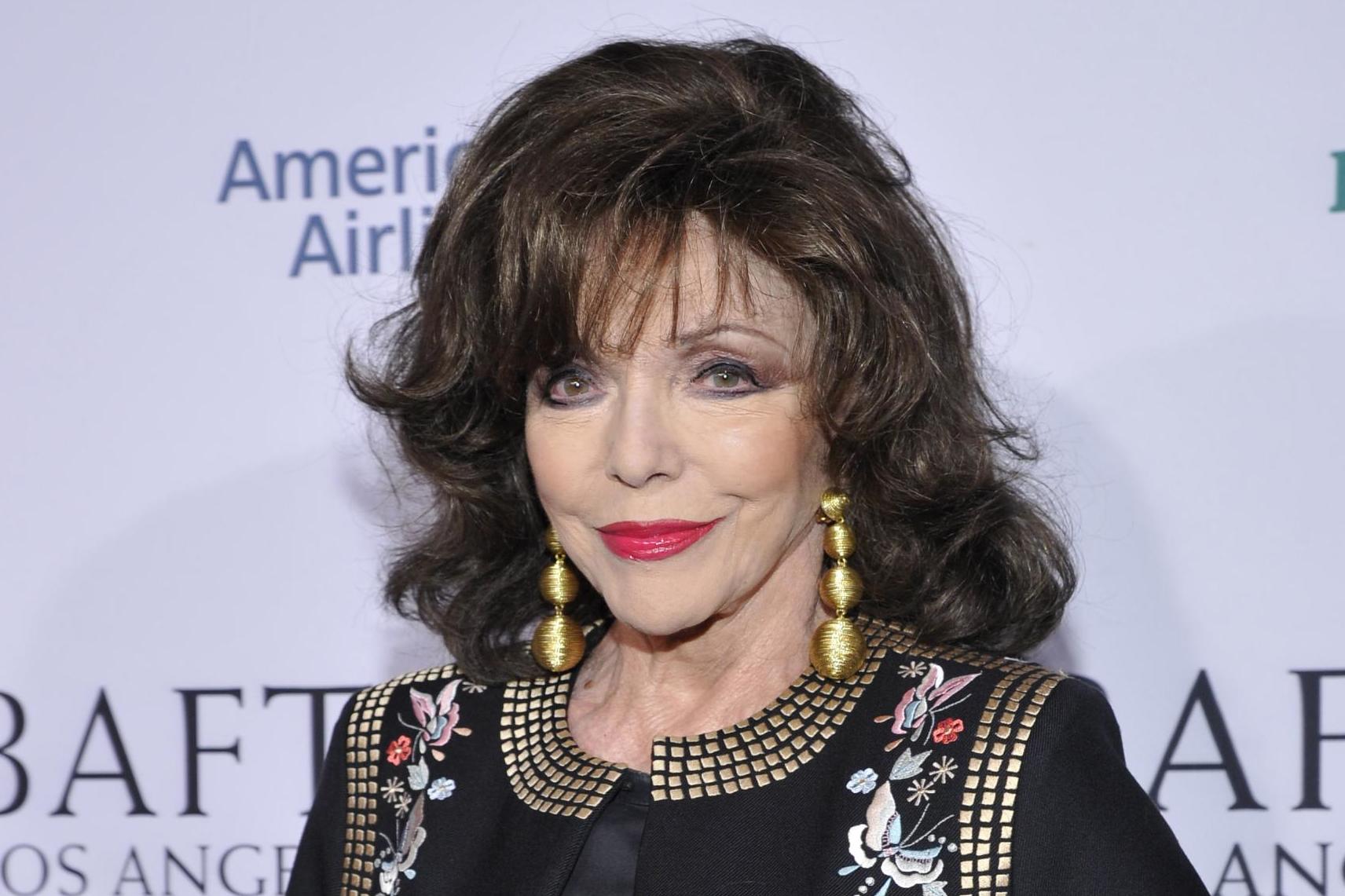 Joan Collins treated for smoke inhalation after 'terrifying' fire at London flat