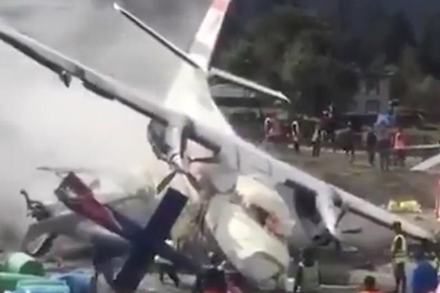 A small Summit Air airplane crashed into a Manang Air helicopter