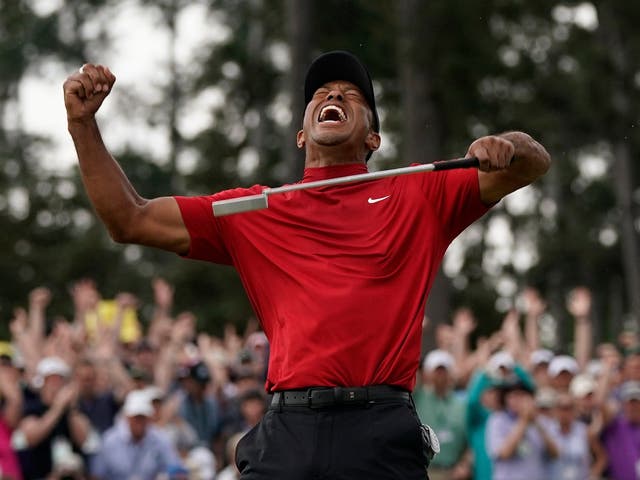 Tiger Woods reacts as he wins The Masters