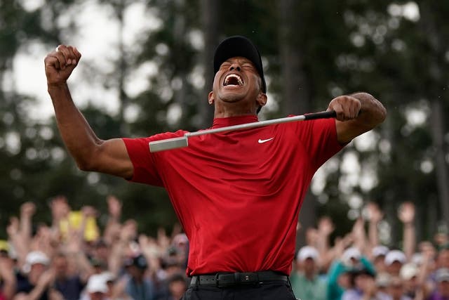 Tiger Woods reacts as he wins The Masters