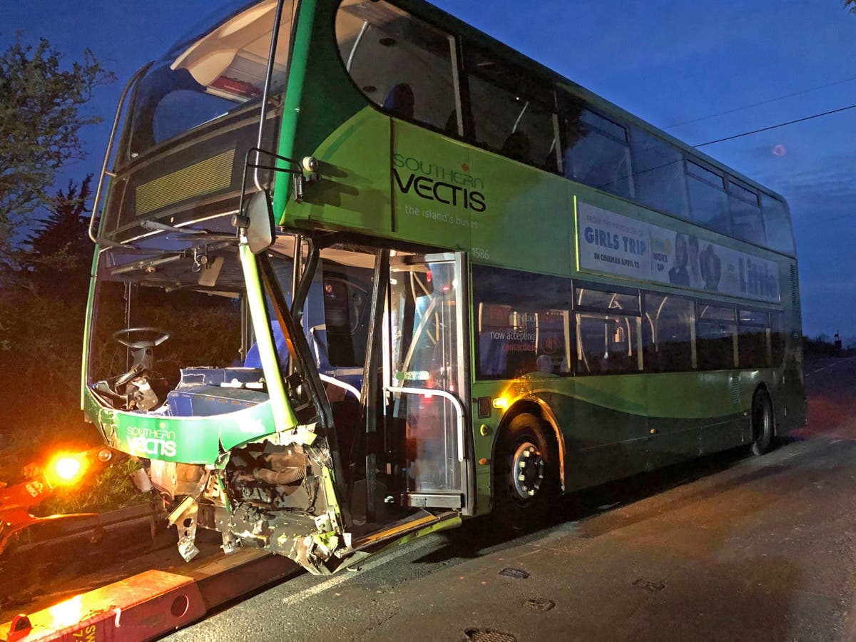 Isle of Wight crash: One dead and more than 20 injured after cars collide with double-decker bus