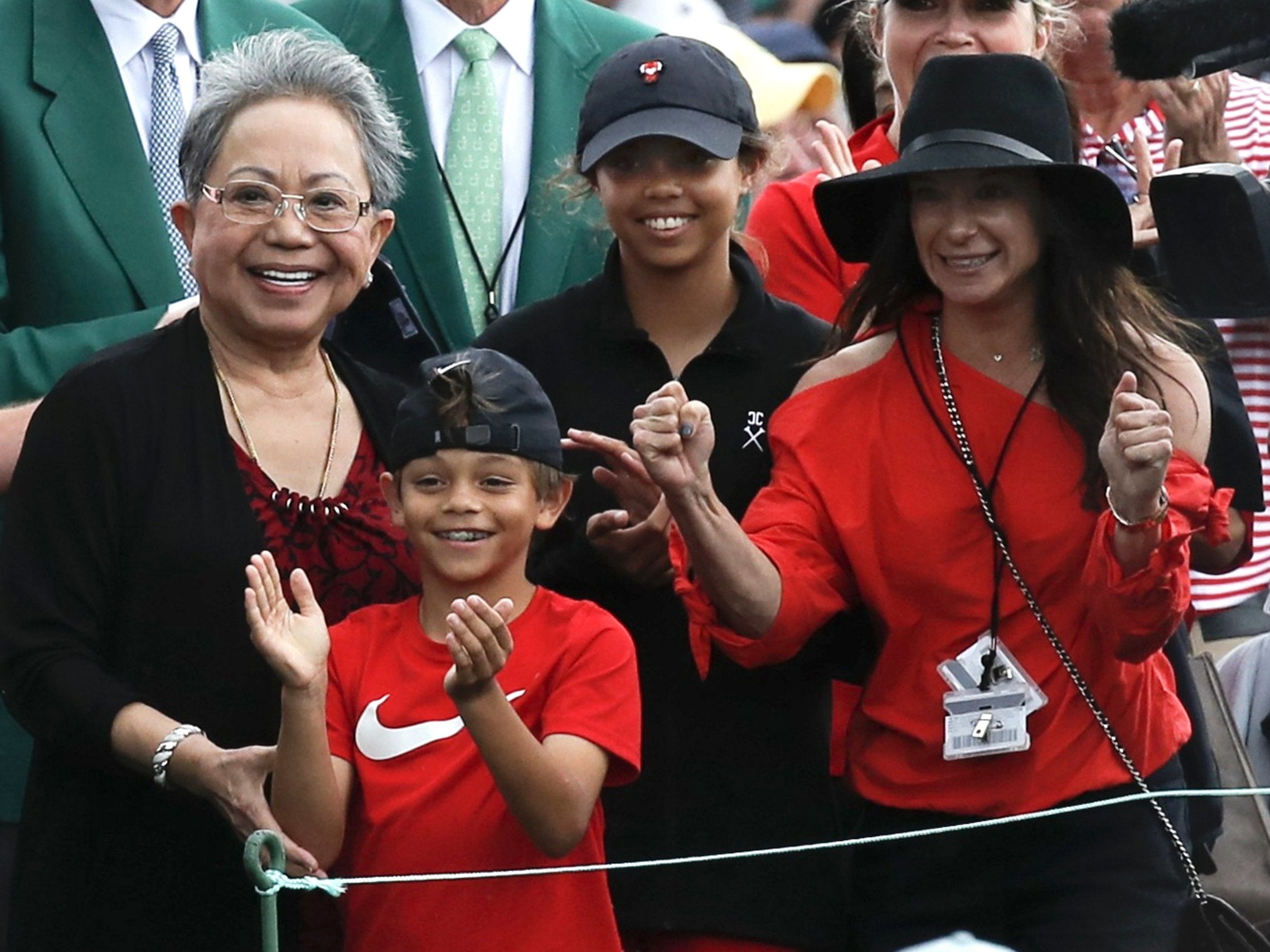 Woods was watched by his mother, two children and partner as he powered to victory