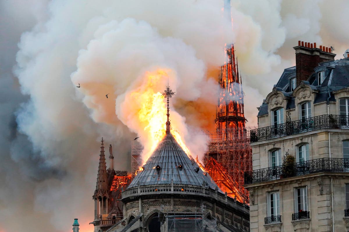 Notre Dame fire: Cathedral blaze 'being treated as an accident' as firefighters continue to fight flames – as it happened