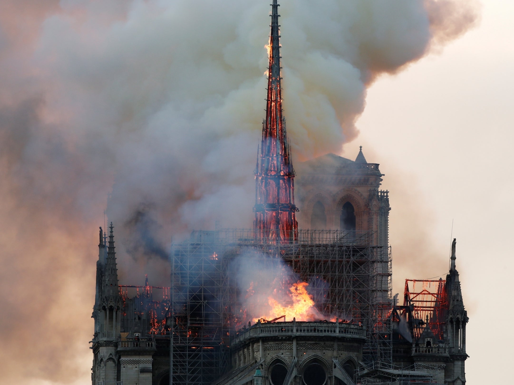 Notre Dame cathedral fire: One firefighter seriously injured in Paris blaze, officials say