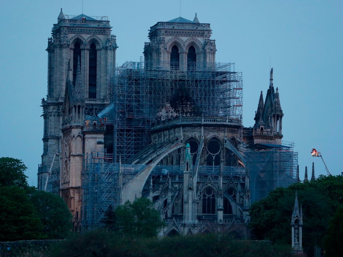 Notre Dame fire: Macron announces fundraising campaign saying cathedral 'will be rebuilt' - here's how to donate