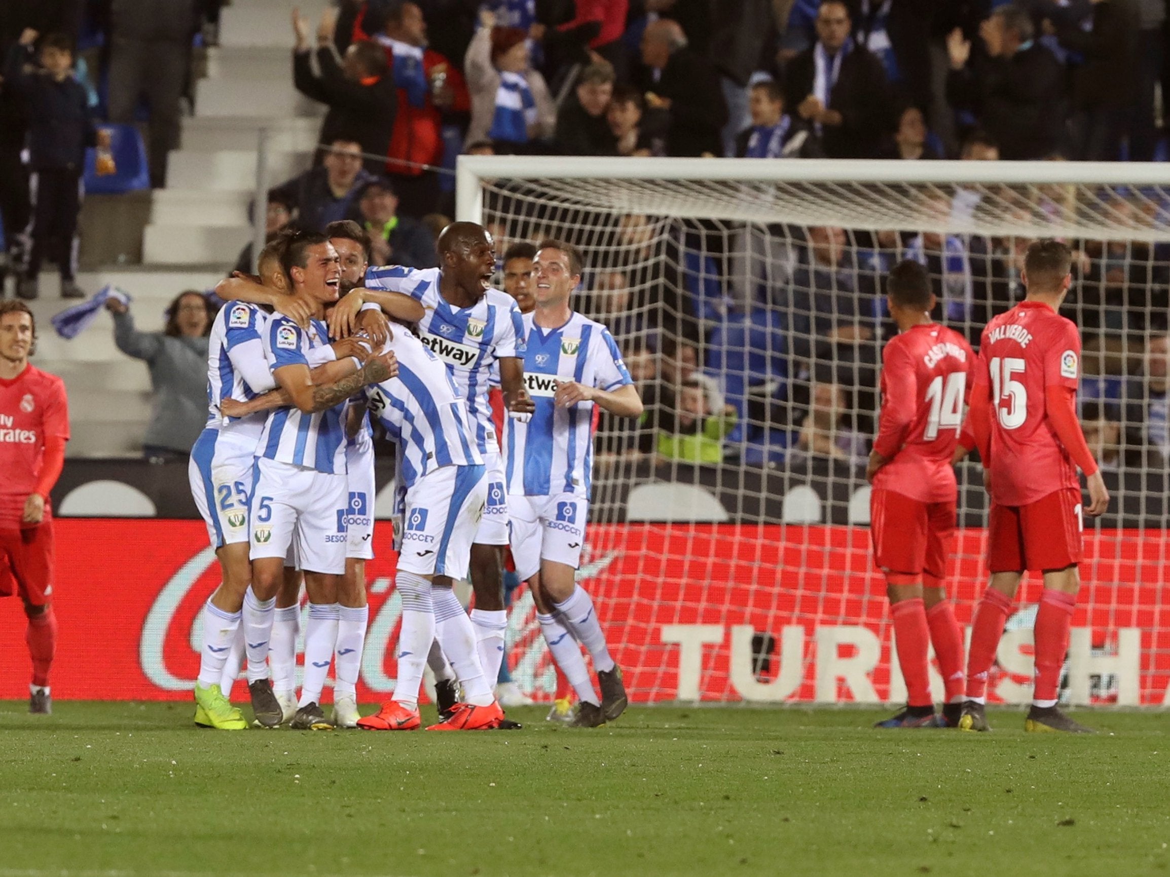 Jonathan Silva celebrates with teammates after giving Leganes a 1-0 lead against Real Madrid
